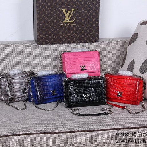 Louis Vuitton Croco di torsione in pelle catena Portafoglio M92182