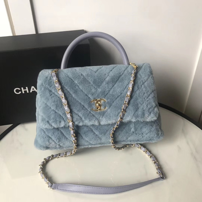 Chanel flap bag with top handle A92991 light blue