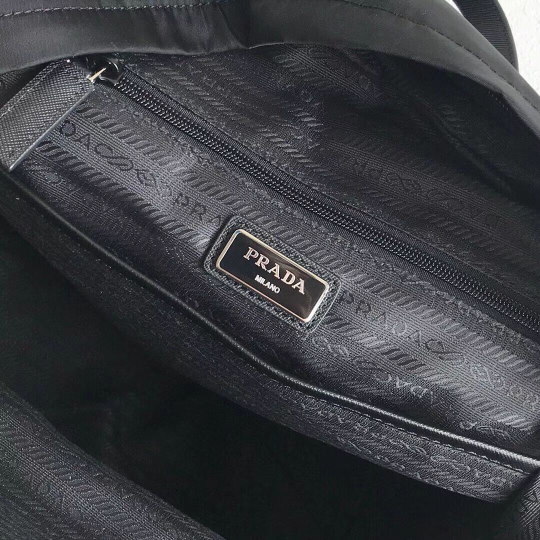 Prada Printed technical fabric backpack 2VZ025 black&orange