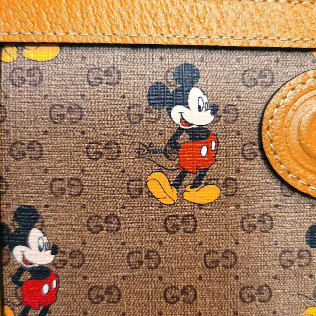 Gucci Disney x zip around wallet 602532 brown