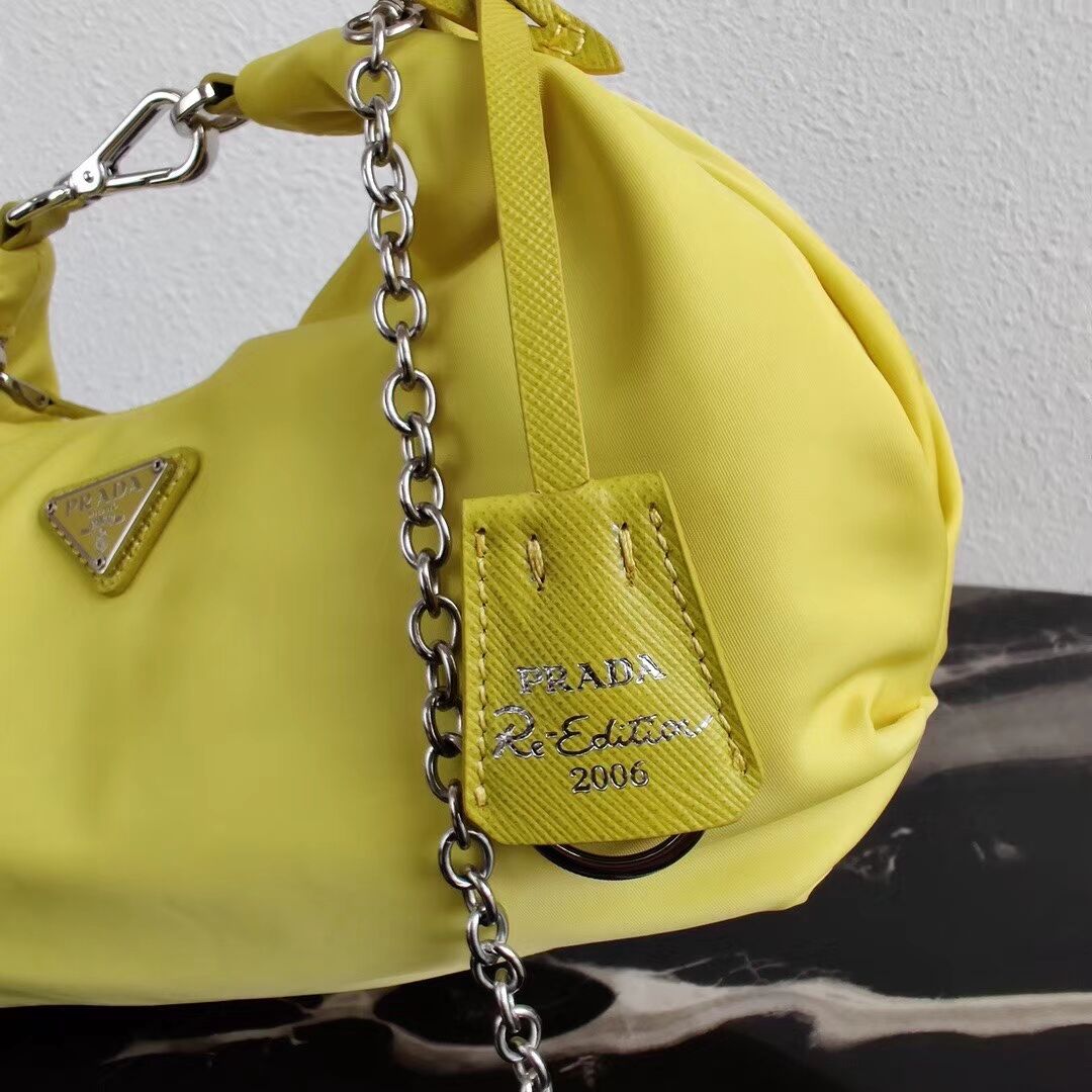 Prada Re-Edition 2005 nylon shoulder bag 1BH172 yellow