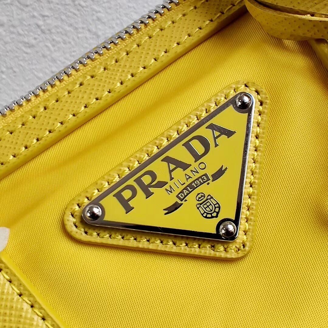 Prada Re-Edition 2005 top-handle bag 1PR846 yellow