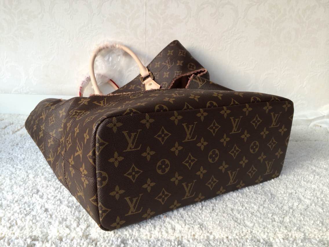 Louis Vuitton Original Leather Monogram canvas BAG WITH HOLES REI KAWAKUBO M40279