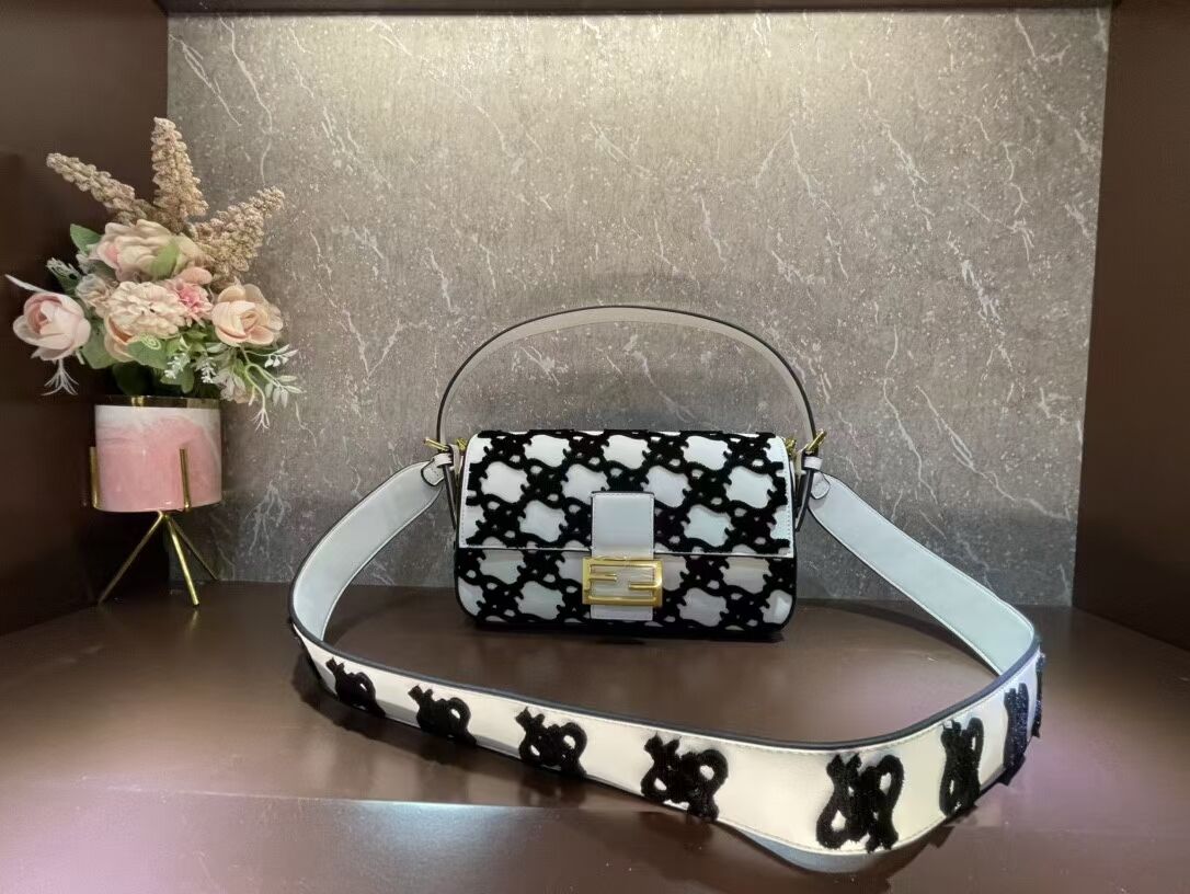 Fendi BAGUETTE Black and white braided leather bag 8BR600A