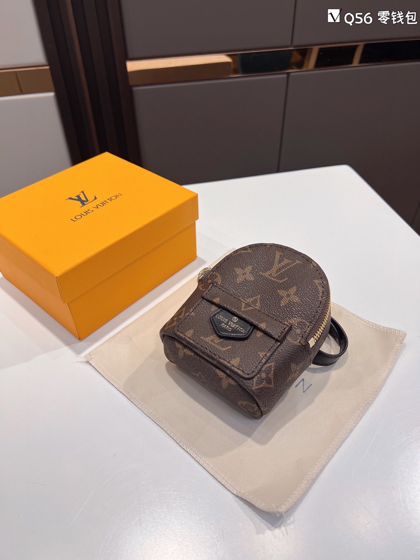 Louis Vuitton Monogram Canvas Mini Wrist Bag M12587