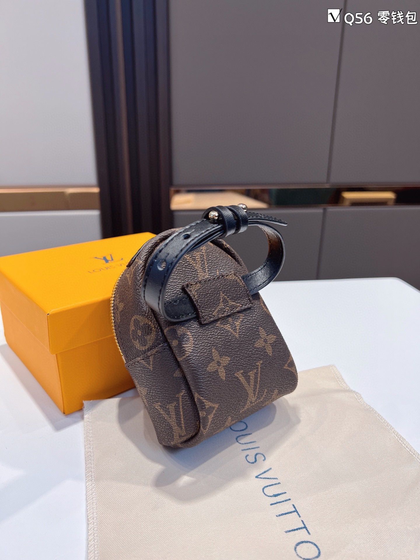 Louis Vuitton Monogram Canvas Mini Wrist Bag M12587