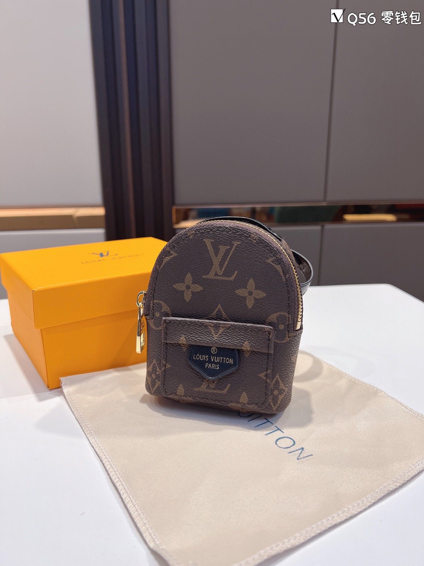 Louis Vuitton Monogram Canvas Mini Wrist Bag M12587