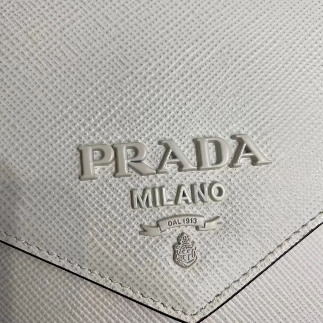 Prada Monochrome Saffiano and leather bag 1BD317 white