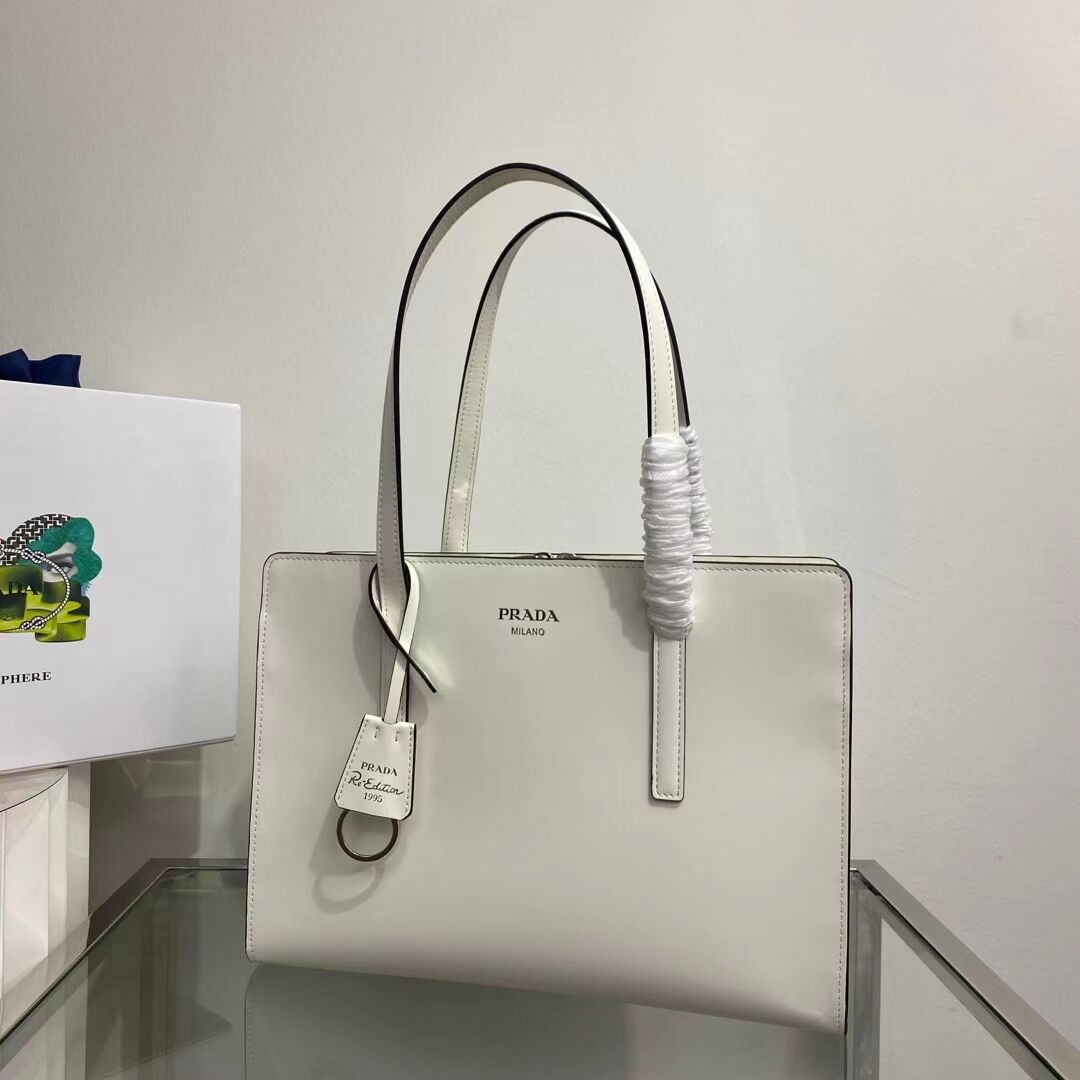 Prada Re-Edition 1995 brushed-leather medium handbag 1BA350 white