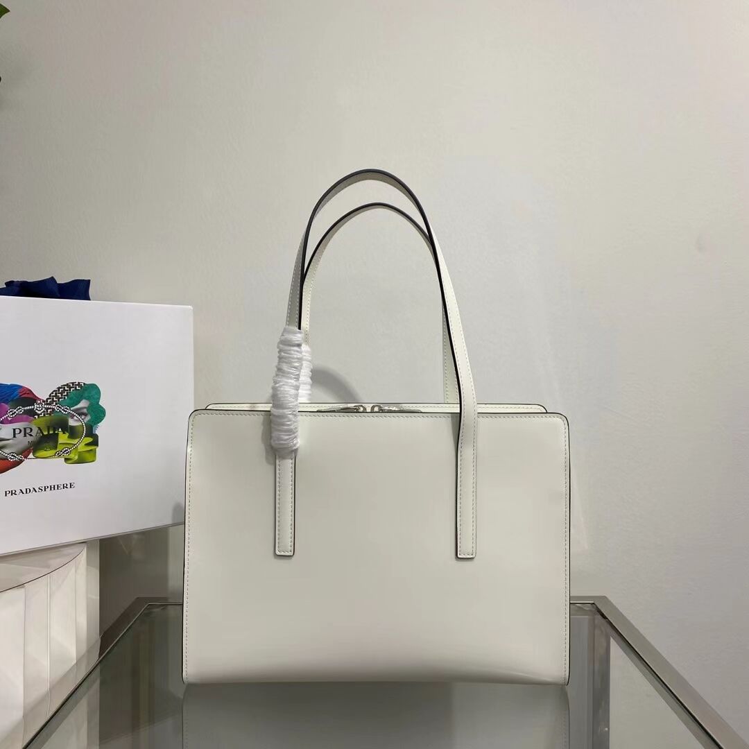 Prada Re-Edition 1995 brushed-leather medium handbag 1BA350 white