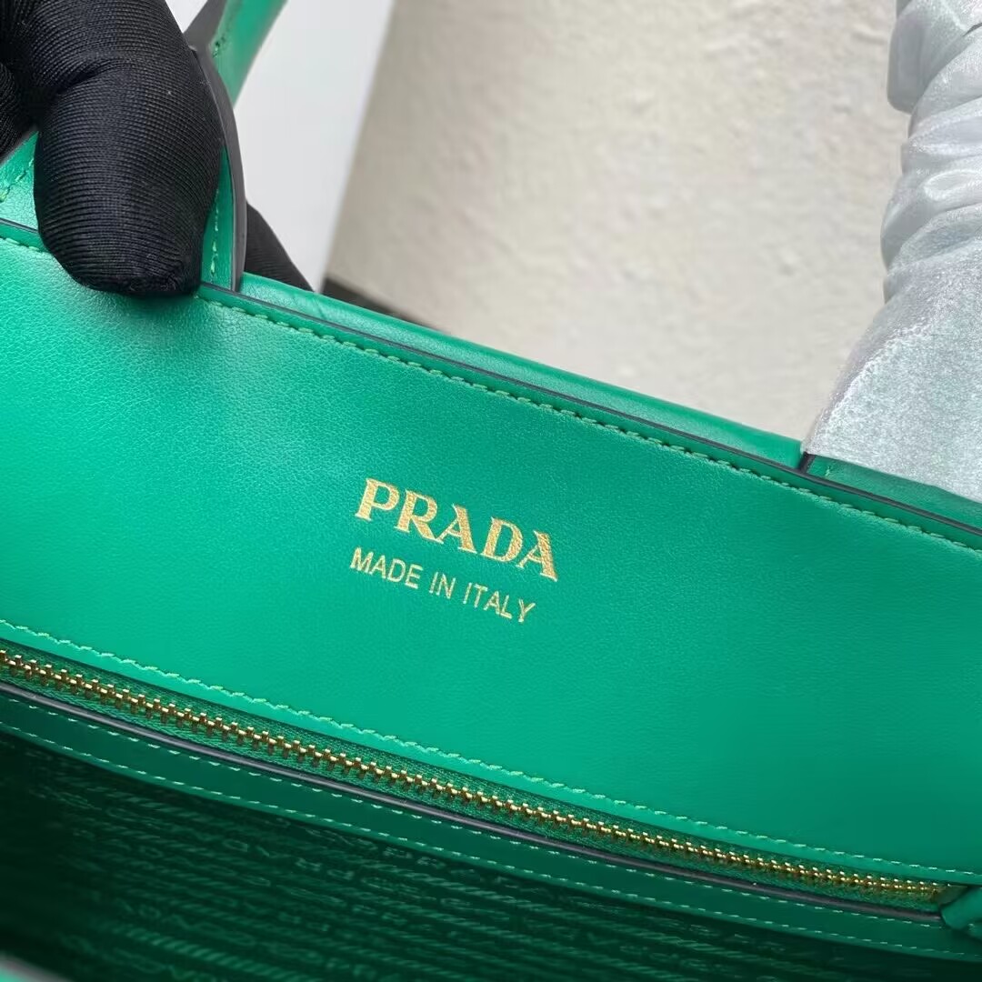 Small leather Prada Symbole bag with topstitching 1HH039 green