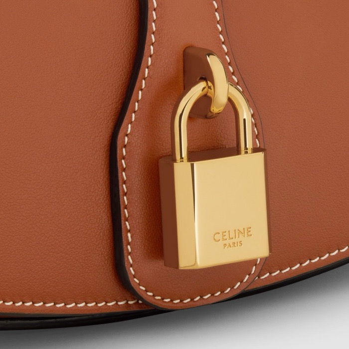 CELINE CLUTCH ON STRAP TABOU IN SUPPLE CALFSKIN 101592 TAN