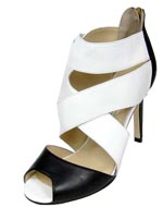 Manolo Blahnik black and white back slide fastener pumps